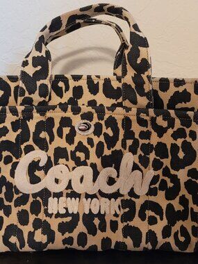 coach cargo leopard medium  (damaged)